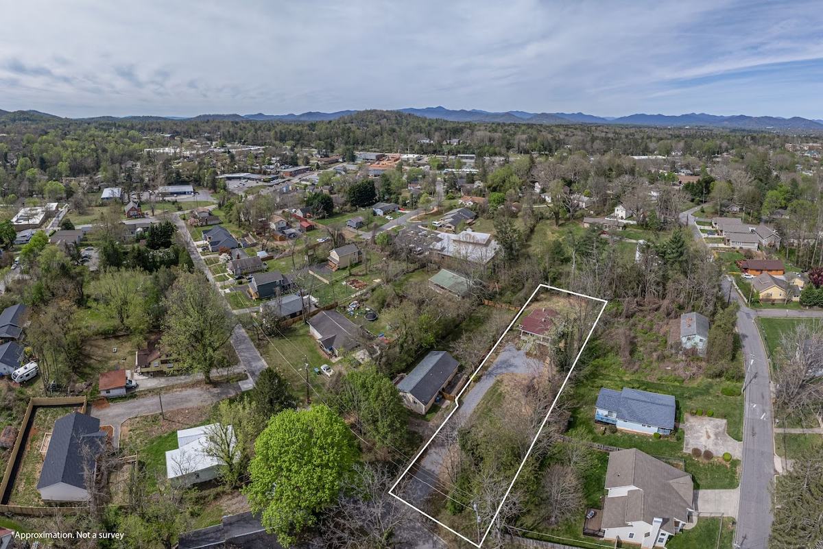 Second aerial view of the lot and surrounding neighborhood