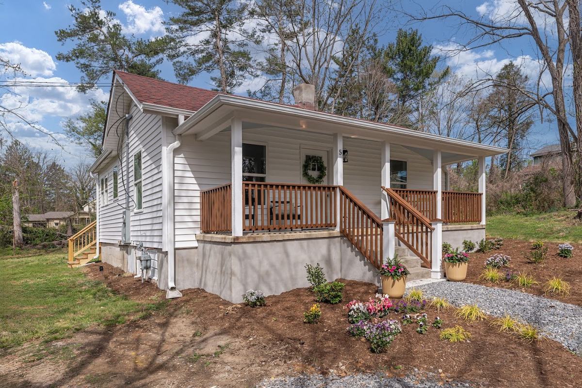 Front corner view of the cottage and porch